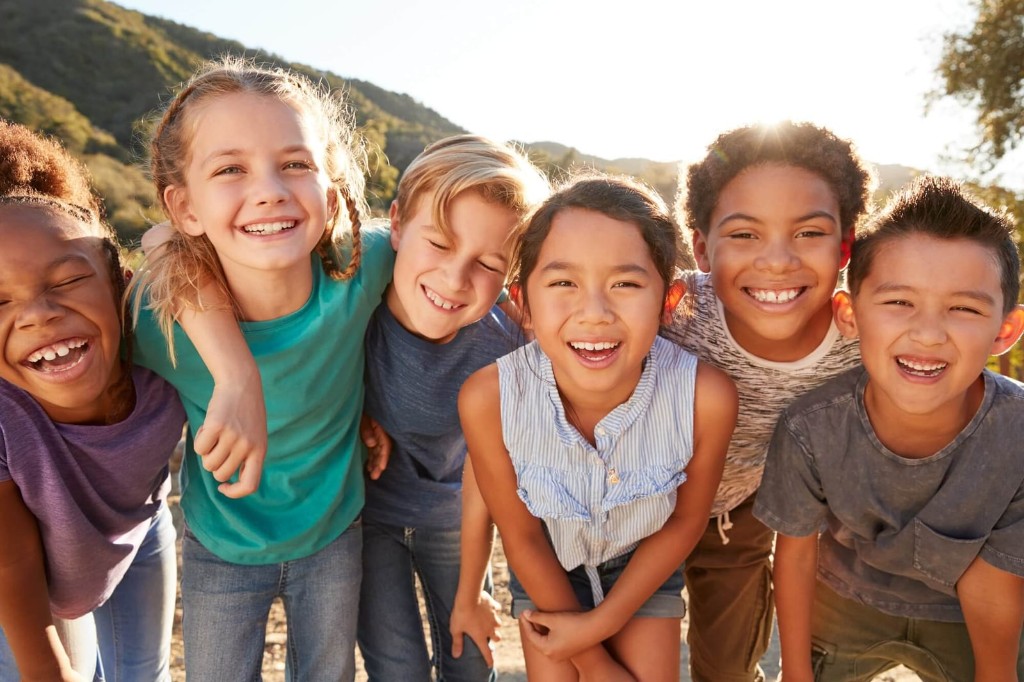 Children laughing together outdoors
